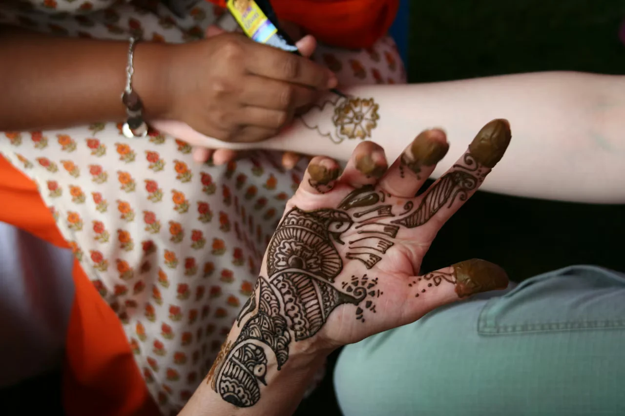eid mehndi design — eid, person, green, pants · MyMehndiDesigns.com
